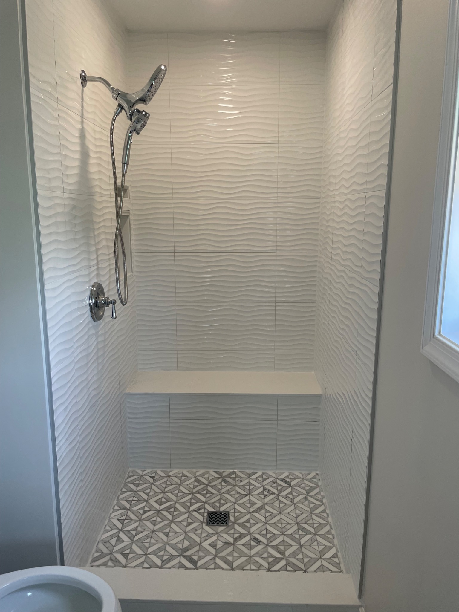 White wave tile shower